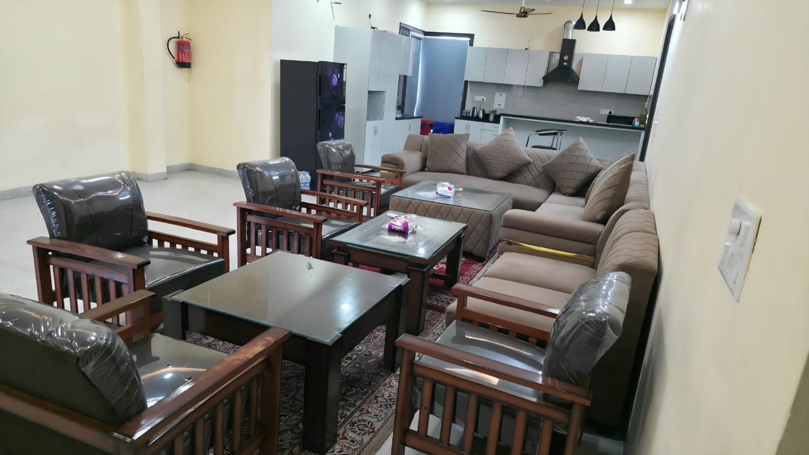 Seating area opening onto the kitchen at Jastej House homestay